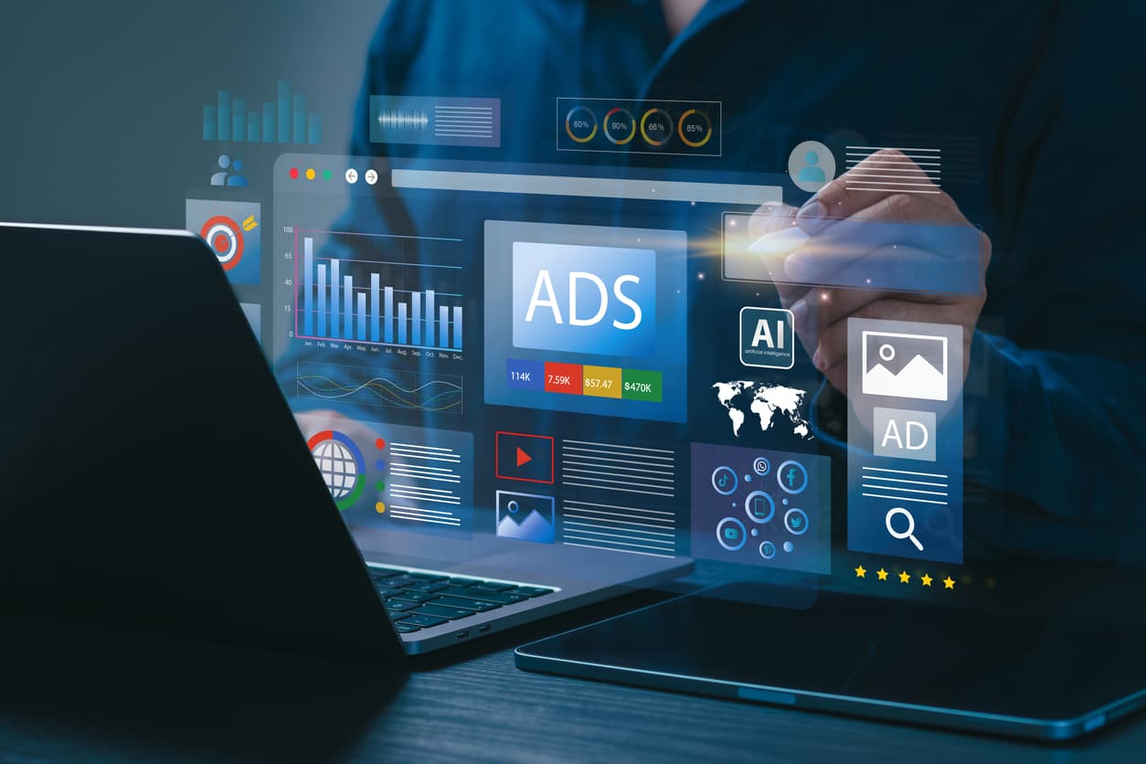 Businessman using laptop with Ads dashboard digital marketing strategy analysis for branding